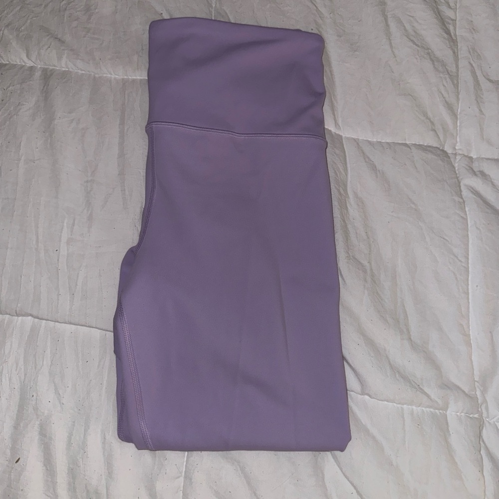 Light purple ATHLETA leggings.